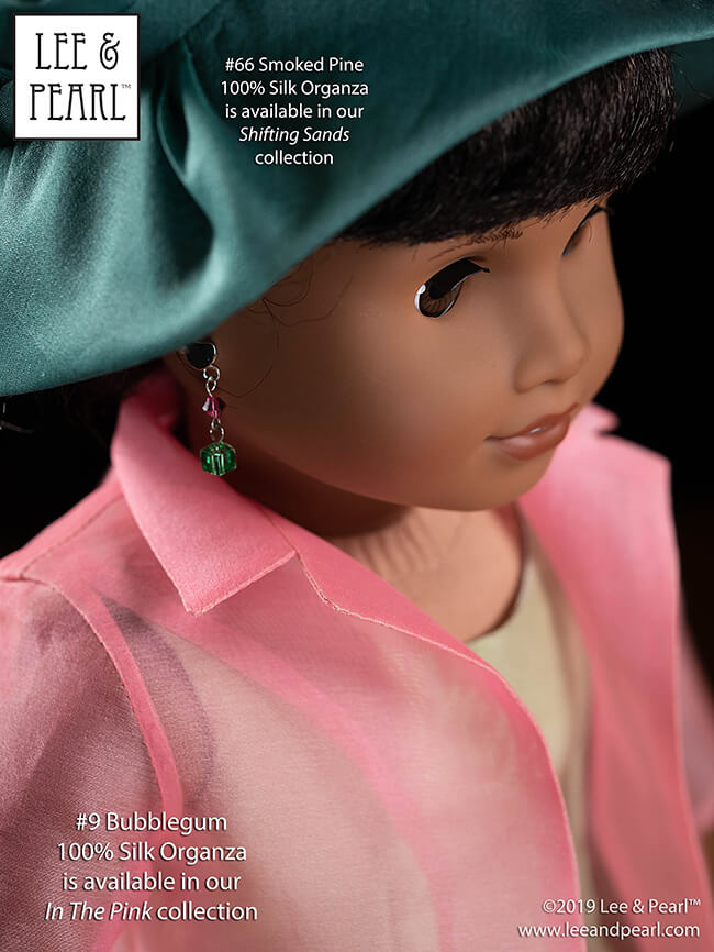 Look what we made for our 18 inch American Girl doll using Lee & Pearl Patterns 1025 and 2064 — and beautiful, shimmering 100% SILK ORGANZA from the Lee & Pearl Etsy store! Our girl’s trendy, translucent overcoat was made from beautiful bubblegum pink silk organza and her vintage style hat was made from smoked pine silk organza. Don’t miss out — over 100 shades of silk organza are currently ON SALE for Cyber Week at 20% off through Friday, December 6, 2019.