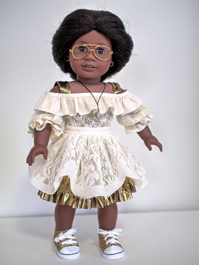 Ralphie50 made this stylish dress for her American Girl doll Addy using gold fabric, a salvaged drapery sheer, and our 2016 FREE pattern for Lee & Pearl mailing list subscribers — 1035: Olá Brasil! Samba Top, Bahia Dress, Baiana Headwrap and Jewelry Tutorials for 18 Inch Dolls. Join our mailing list at www.leeandpearl.com to get your own copy of this wonderful pattern!
