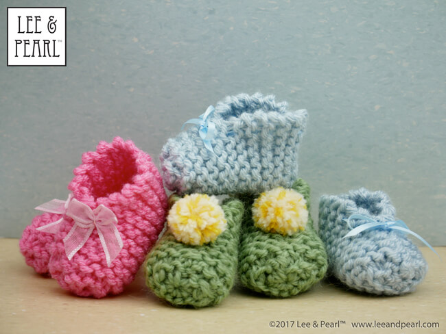 It's Day Four of Lee & Pearl Cyber Week, and we have lots of doll treats for you — a round-up of all our previous Christmas and Chanukah holiday crafts, like these super-cute and super-easy knitted slippers for 18 inch American Girl® dolls.