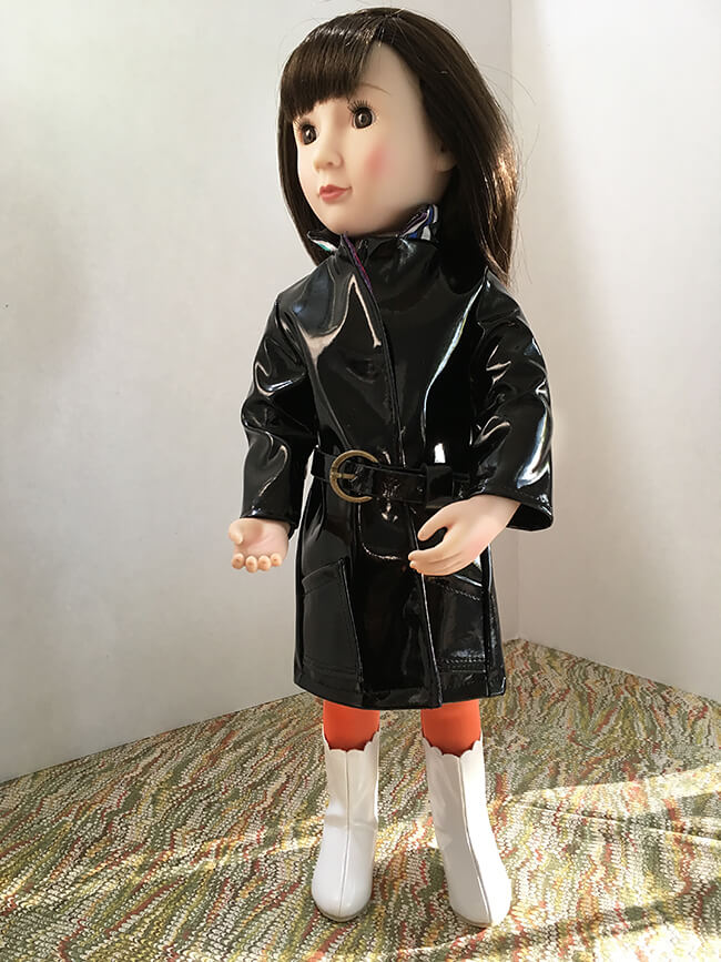 Beate R. made this groovy coat for her 1960s A Girl for All Time® doll Sam using black vinyl and Lee & Pearl Pattern 1025: She Blinded Me with Science Unisex Lab Coat, Unlined Coat and Safety Goggles for 18 inch, 16 inch and 14 1/2 inch dolls. We packed this pattern with just-like-the-real-thing features, then added a couture touch: a back yoke with invisible shaping for a perfect fit. Find this pattern in the #leeandpearl Etsy shop at https://www.etsy.com/shop/leeandpearl