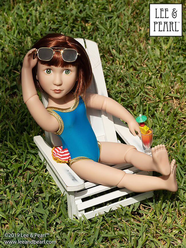 Who else is waiting for the fireworks to start? Our A Girl for All Timel® doll Clementine is wearing a ruffly red-white-and-blue swimsuit that we made using Lee & Pearl Pattern 1058: Retro Ruffled Swimsuit and High Waisted Bikini for Dolls. Find this pattern in the Lee & Pearl Etsy store for 18 inch American Girl, 16 inch AGFAT and 14 1/2 inch WellieWishers dolls.