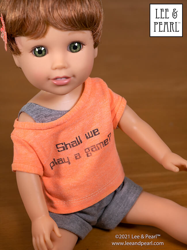 Introducing Pattern 1983: She's a Maniac Off-One-Shoulder Workout T-Shirt for Dolls! We're proud to present this brand new ‘80s / aerobics / workout and dance-inspired pattern for 18 inch American Girl®, 16 inch A Girl for All Time® and 14 ½ inch WellieWishers™ and similar dolls, now available in the Lee & Pearl Etsy store.