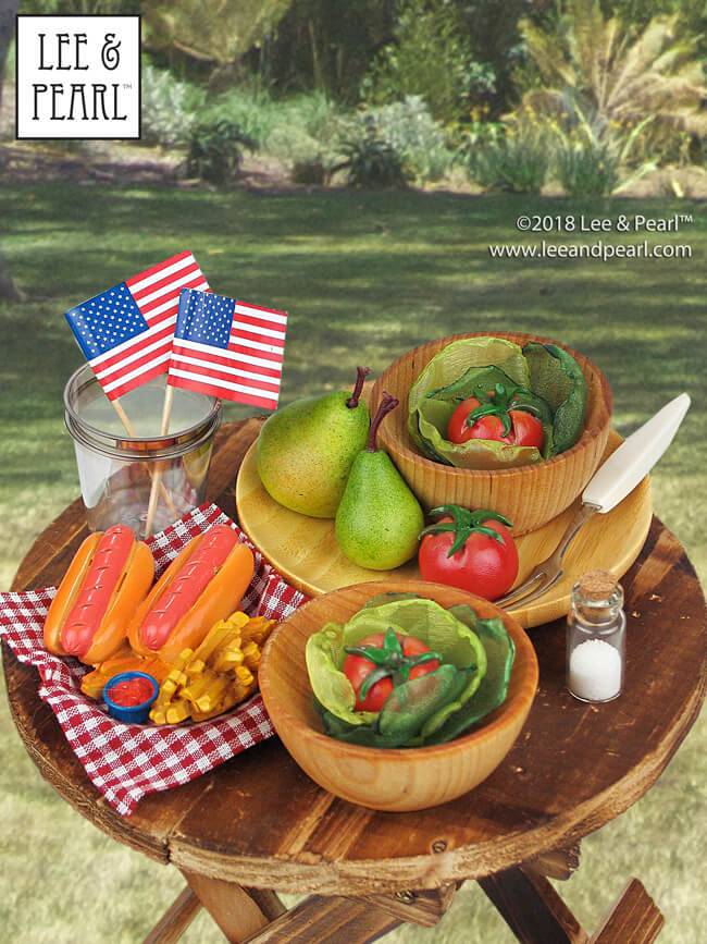 Happy July 4th from Lee & Pearl! Click through to our Newsletter to learn more about the patterns and props we used in our Independence Day picnic scene — and also find links to our tutorials for painting BBQ-ready faux cast iron pots, and making lettuce leaves out of green organza fabric.