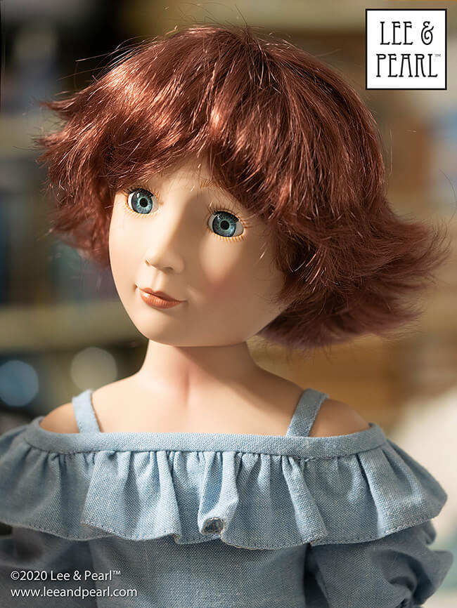 Every girl loves a new ‘do! Here’s our A Girl for All Time® doll Amelia wearing a Monique Roxie wig, size 8-9 in Burgundy. We think she looks so adorable in this retro-style hairdo that we’re going to have to make a new Lee & Pearl pattern to go with it. Stay tuned!