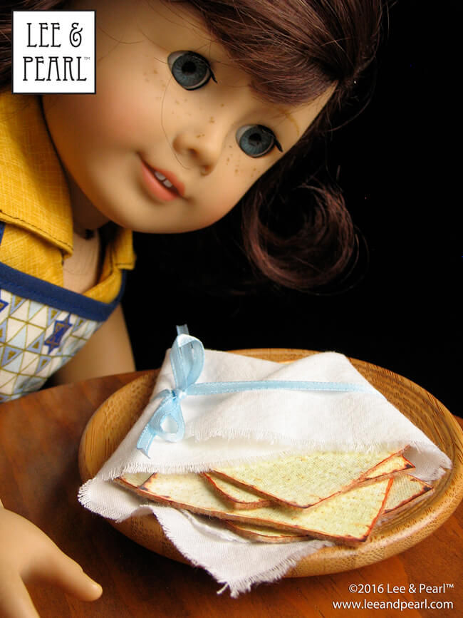 This Passover, make amazingly realistic matzos for your 18 inch / American Girl dolls using Lee & Pearl’s FREE printable download and easy directions. Chag Pesach Sameach!